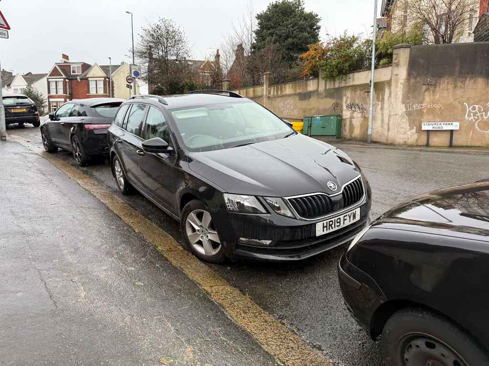 Photograph of HR19 FYW - a Black Skoda Octavia parked in Hollingdean by a non-resident. The eighth of eleven photographs supplied by the residents of Hollingdean.