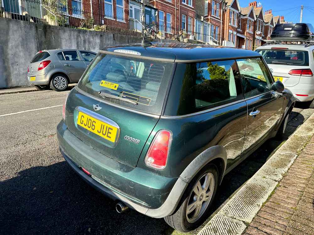 Photograph of GJ06 JUE - a Green Mini Cooper parked in Hollingdean by a non-resident. The second of twenty-four photographs supplied by the residents of Hollingdean.