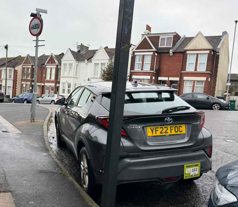 Photograph of YF22 FOC - a Grey Toyota C-HR taxi parked in Hollingdean by a non-resident. The sixth of seven photographs supplied by the residents of Hollingdean.