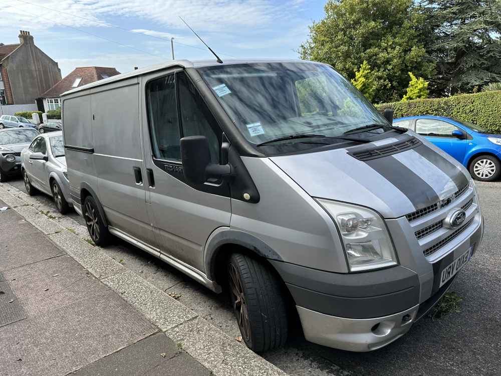 Photograph of EX10 VRU - a Silver Ford Transit parked in Hollingdean by a non-resident. The third of sixteen photographs supplied by the residents of Hollingdean.