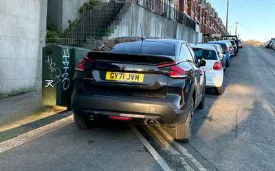 GY71 JVM, a Black Citroen C4 parked in Hollingdean