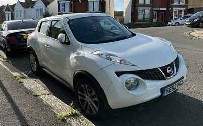 VE62 PGX, a White Nissan Juke parked in Hollingdean