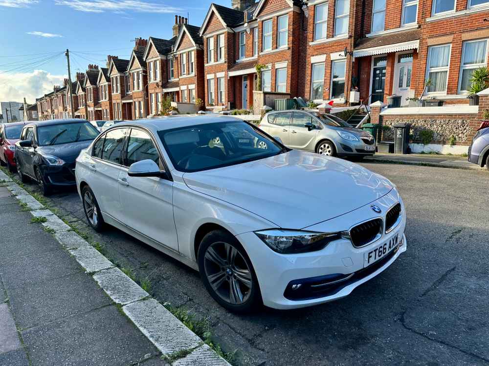 Photograph of FT66 AXW - a White BMW 3 Series parked in Hollingdean by a non-resident who uses the local area as part of their Brighton commute. The fourth of nine photographs supplied by the residents of Hollingdean.