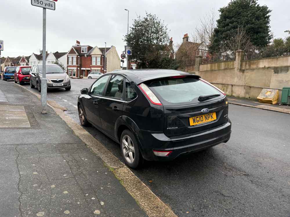 Photograph of WG10 NPK - a Black Ford Focus parked in Hollingdean by a non-resident. The fourth of five photographs supplied by the residents of Hollingdean.