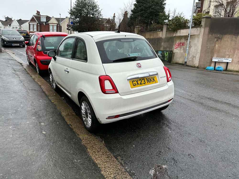 Photograph of GX23 NKK - a White Fiat 500 parked in Hollingdean by a non-resident. The second of six photographs supplied by the residents of Hollingdean.