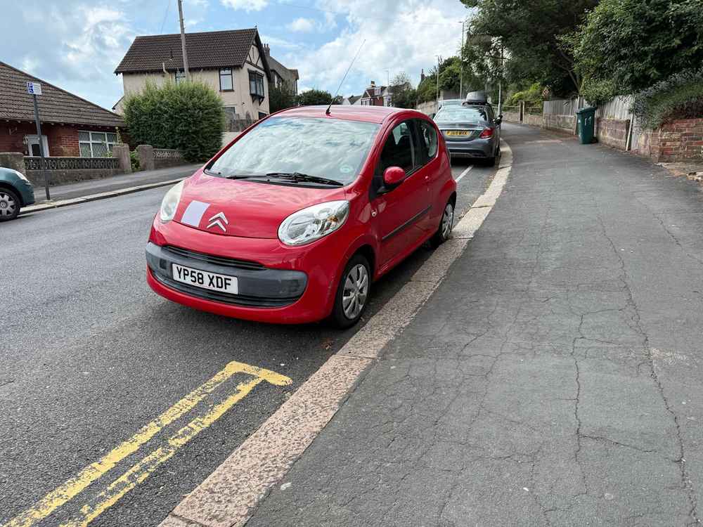 Photograph of YP58 XDF - a Red Citroen C1 parked in Hollingdean by a non-resident, and potentially abandoned. The sixteenth of twenty photographs supplied by the residents of Hollingdean.