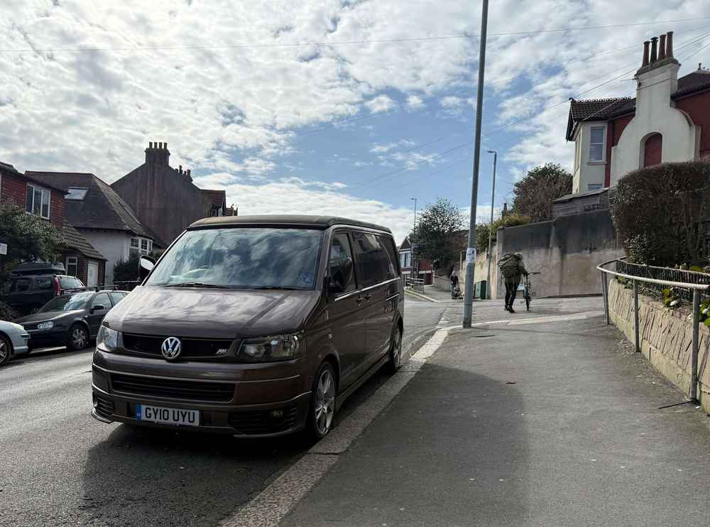 Photograph of GY10 UYU - a Brown Volkswagen Transporter camper van parked in Hollingdean by a non-resident. The twelfth of sixteen photographs supplied by the residents of Hollingdean.