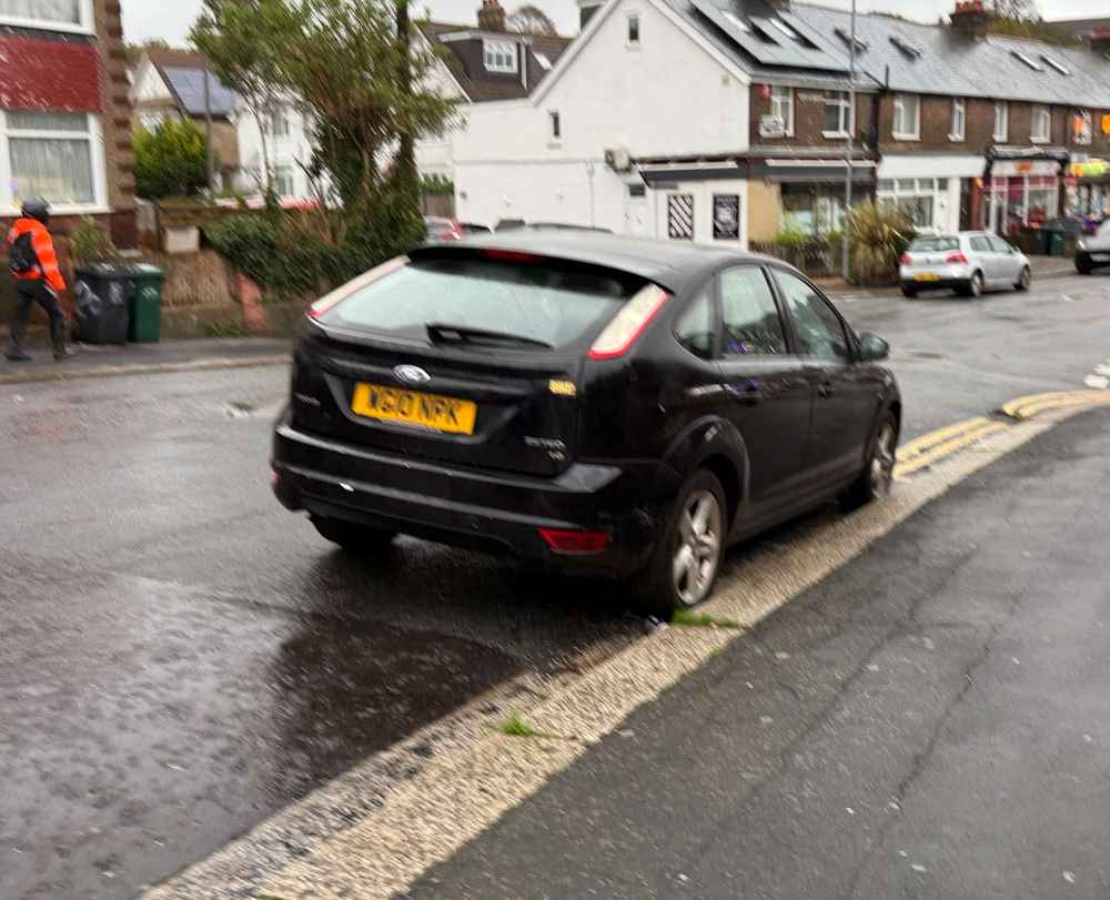 Photograph of WG10 NPK - a Black Ford Focus parked in Hollingdean by a non-resident. The twelfth of seventeen photographs supplied by the residents of Hollingdean.
