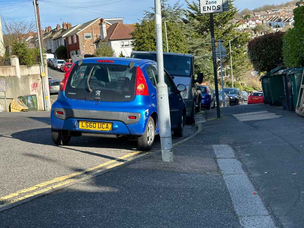 Photograph of LS60 UCA - a Blue Peugeot 107 parked in Hollingdean by a non-resident. The eighth of thirteen photographs supplied by the residents of Hollingdean.