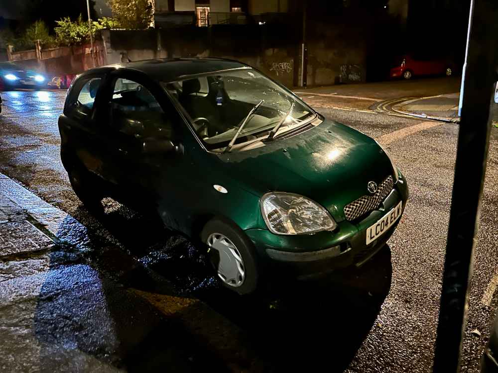 Photograph of LC04 ELW - a Green Toyota Yaris parked in Hollingdean by a non-resident. The sixth of twelve photographs supplied by the residents of Hollingdean.