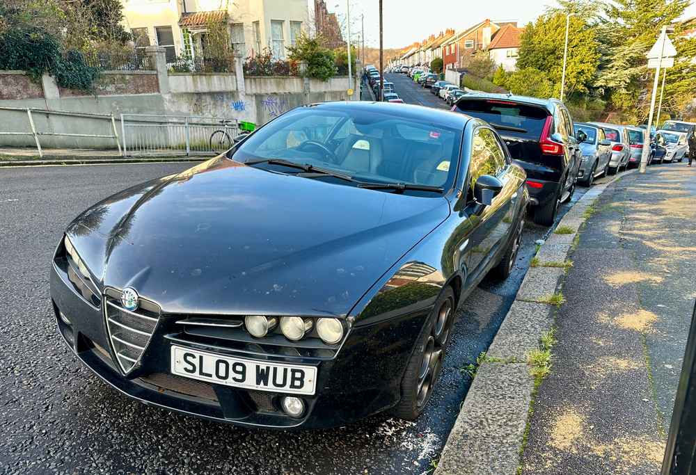 Photograph of SL09 WUB - a Black Alfa Romeo Brera parked in Hollingdean by a non-resident. The fourteenth of twenty-six photographs supplied by the residents of Hollingdean.