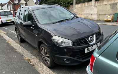 NL10 UTB, a Black Nissan Qashqai parked in Hollingdean