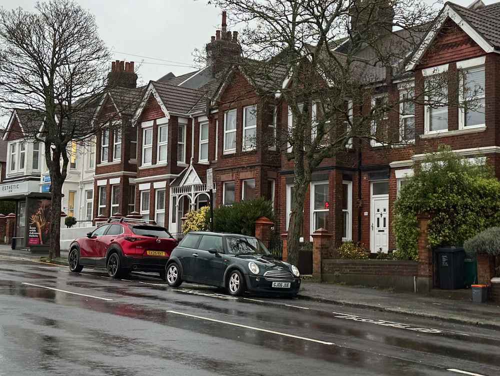 Photograph of GJ06 JUE - a Green Mini Cooper parked in Hollingdean by a non-resident. The twenty-fourth of twenty-four photographs supplied by the residents of Hollingdean.