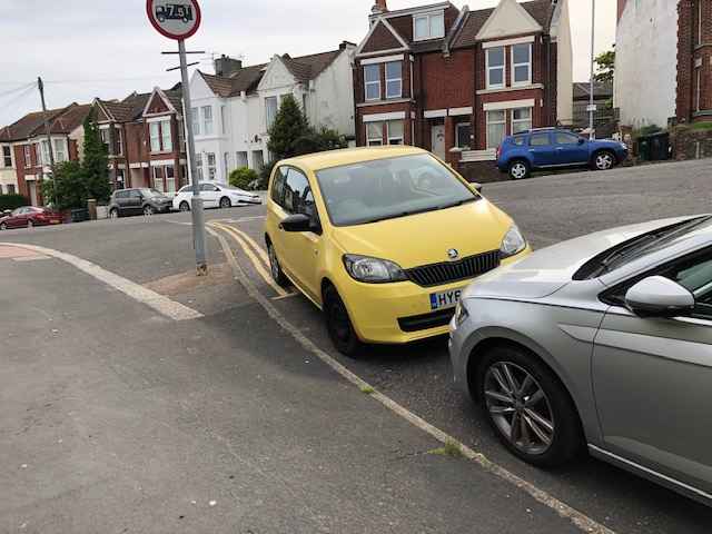 Photograph of HY63 NZU - a Yellow Skoda Citigo parked in Hollingdean by a non-resident. The second of four photographs supplied by the residents of Hollingdean.