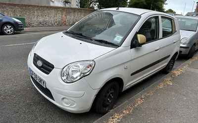 GF59 UKY, a White Kia Picanto parked in Hollingdean