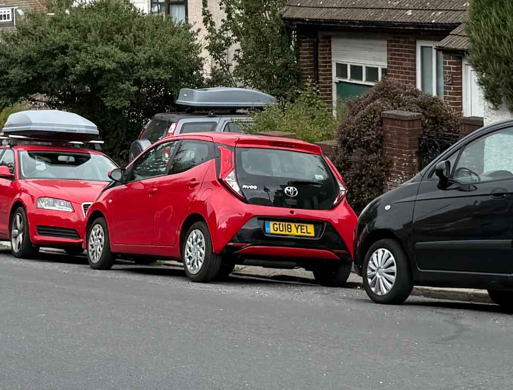 Photograph of GU18 YEL - a Red Toyota Aygo parked in Hollingdean by a non-resident. The fourth of five photographs supplied by the residents of Hollingdean.