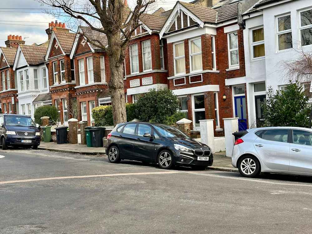 Photograph of PE17 VBN - a Black BMW 2 Series parked in Hollingdean by a non-resident. The third of three photographs supplied by the residents of Hollingdean.